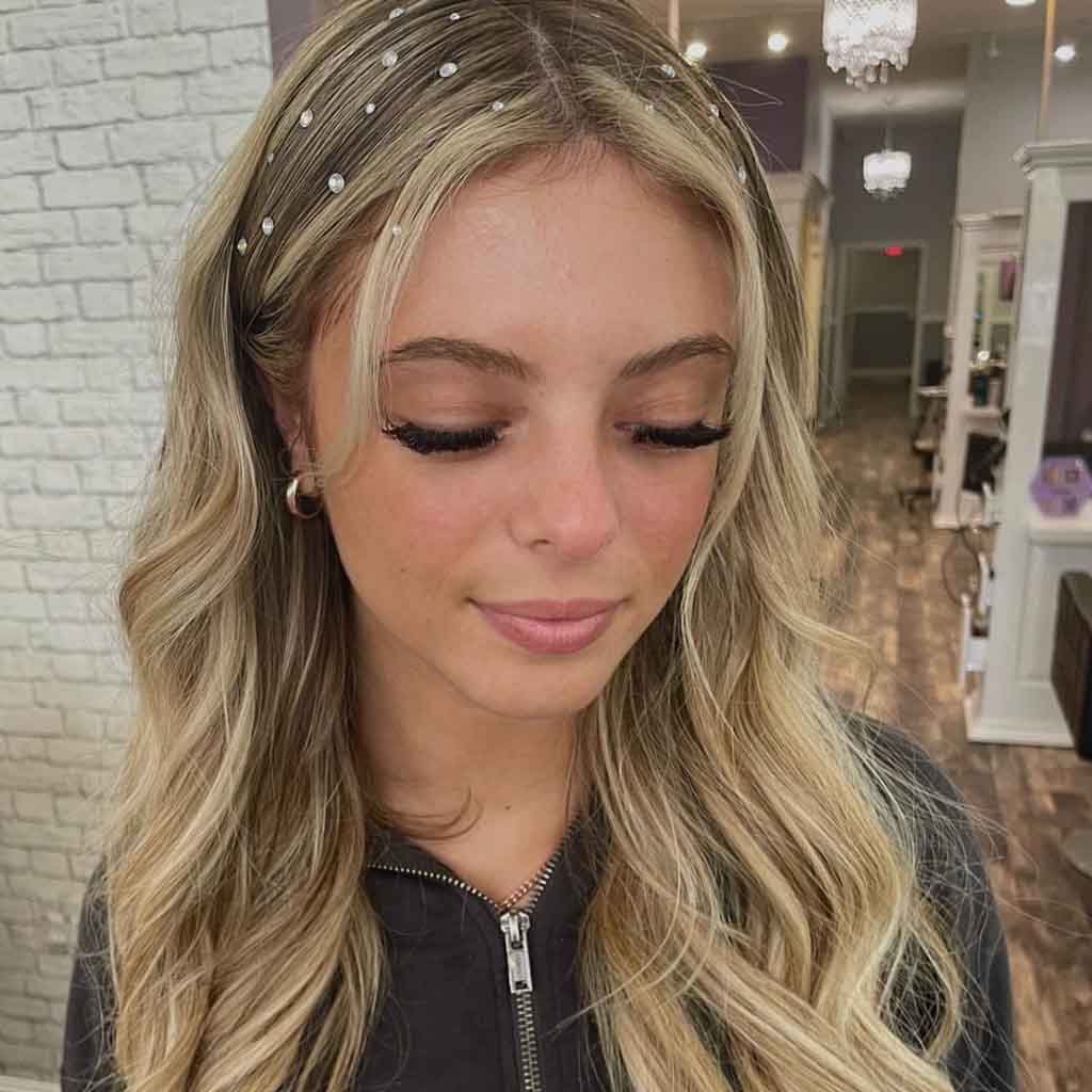 Classy Center Parted Bronde Wavy Hair With Tendrils