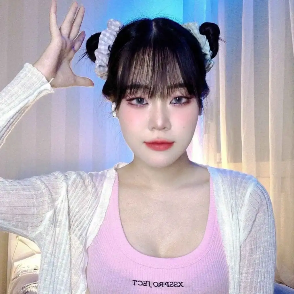 Korean Style Space Buns With Choppy Bangs