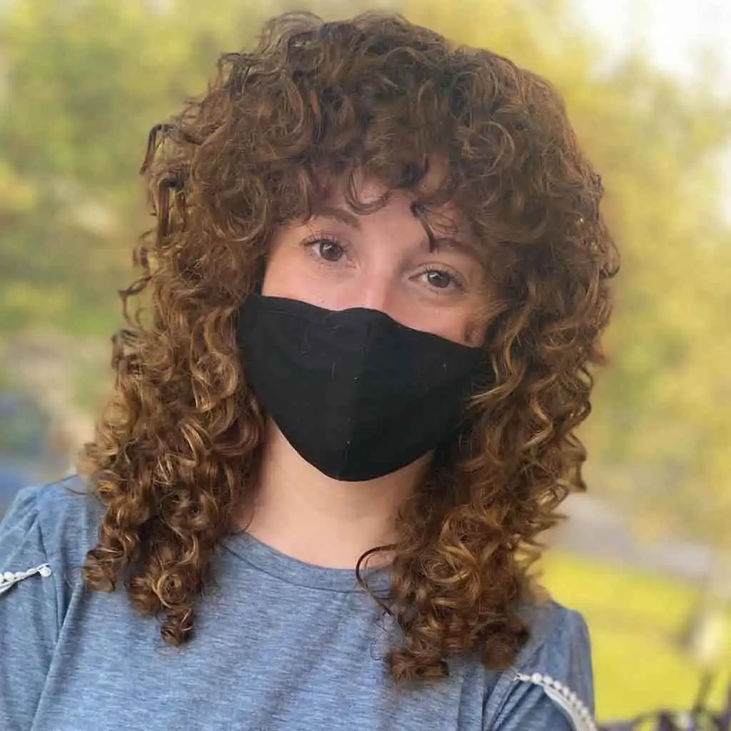 Layered Medium Shaggy Spiral Curls With Choppy Bangs
