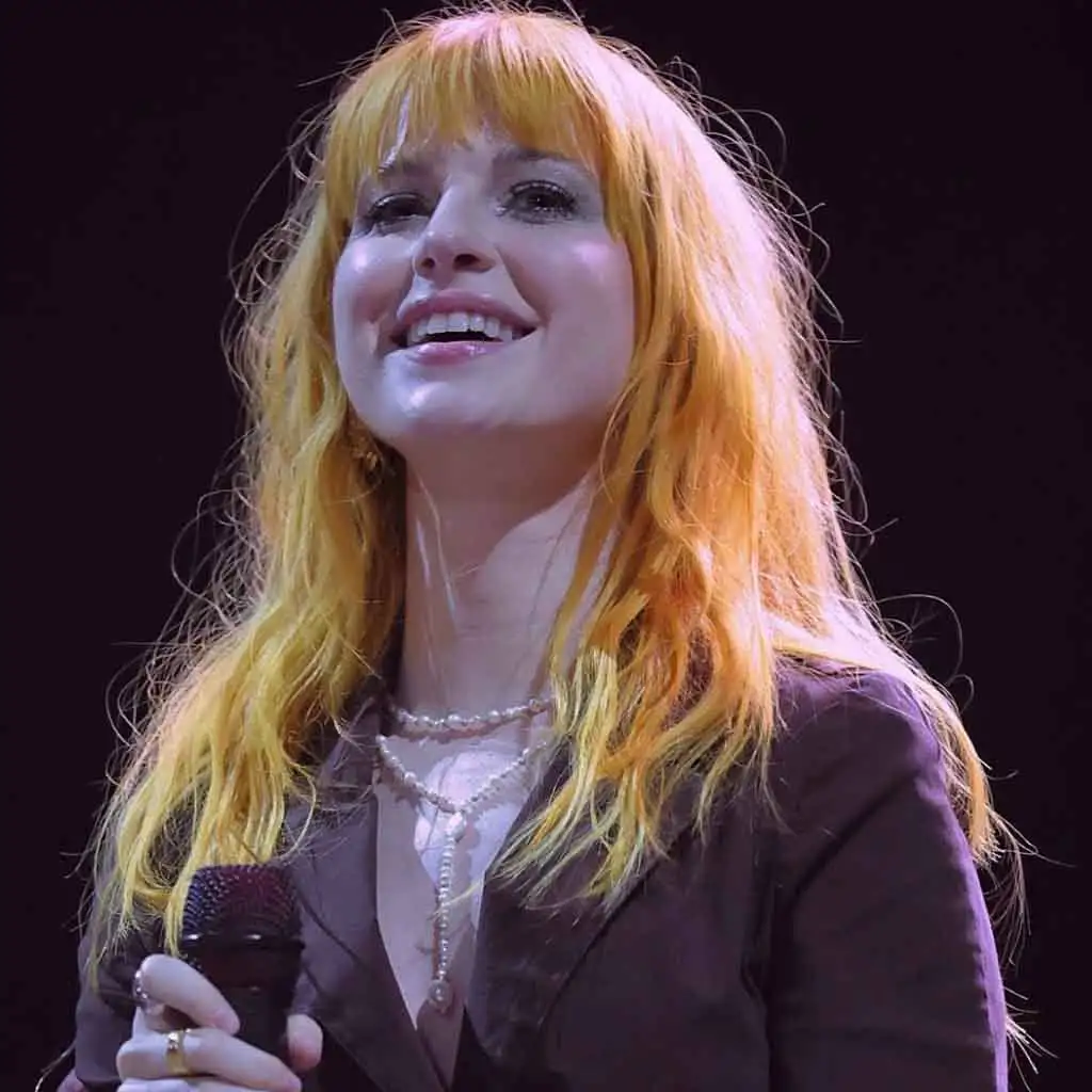 Long Yellow Wavy Tousled Hair With Bangs
