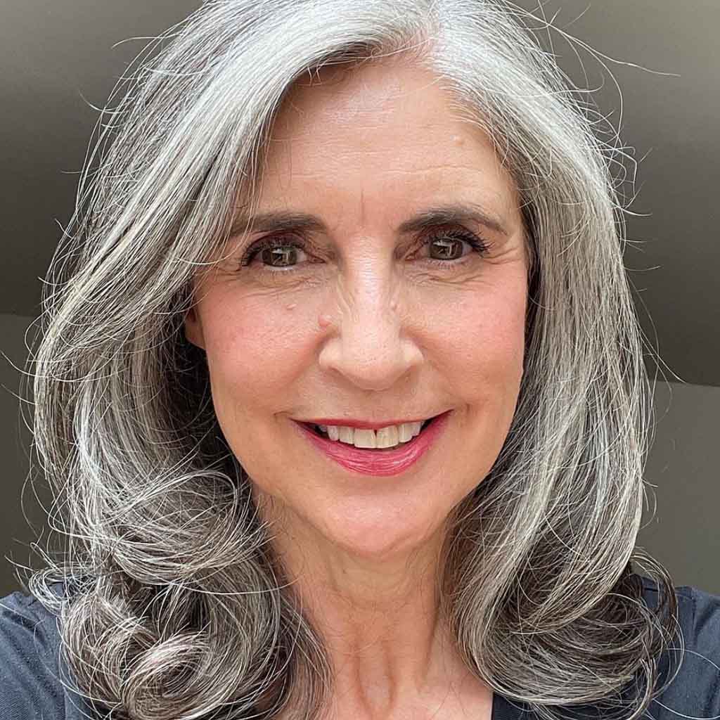 Shoulder Length Side Swept Blowout Hair