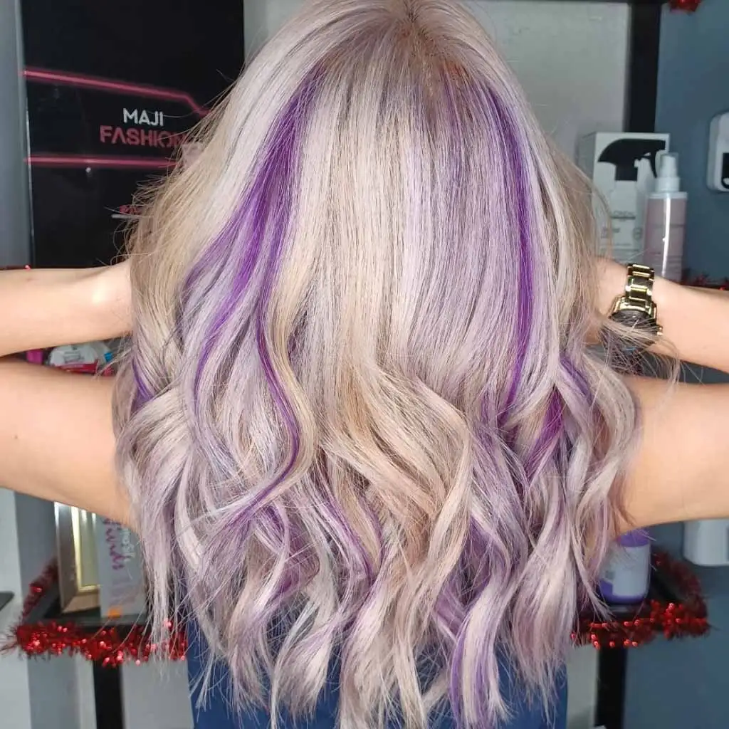 Tousled Bleached Blonde Hair With Purple Highlights