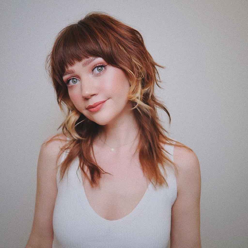 70’s Style Medium Shag Cut With Blonde Peek-a-Boo