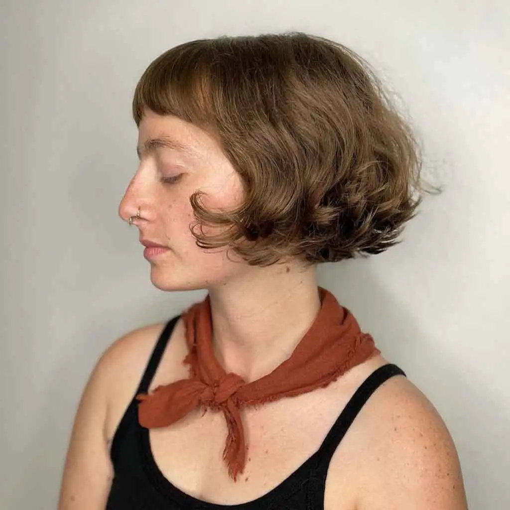 Razor Cut French Wavy Bob With Asymmetric Bangs