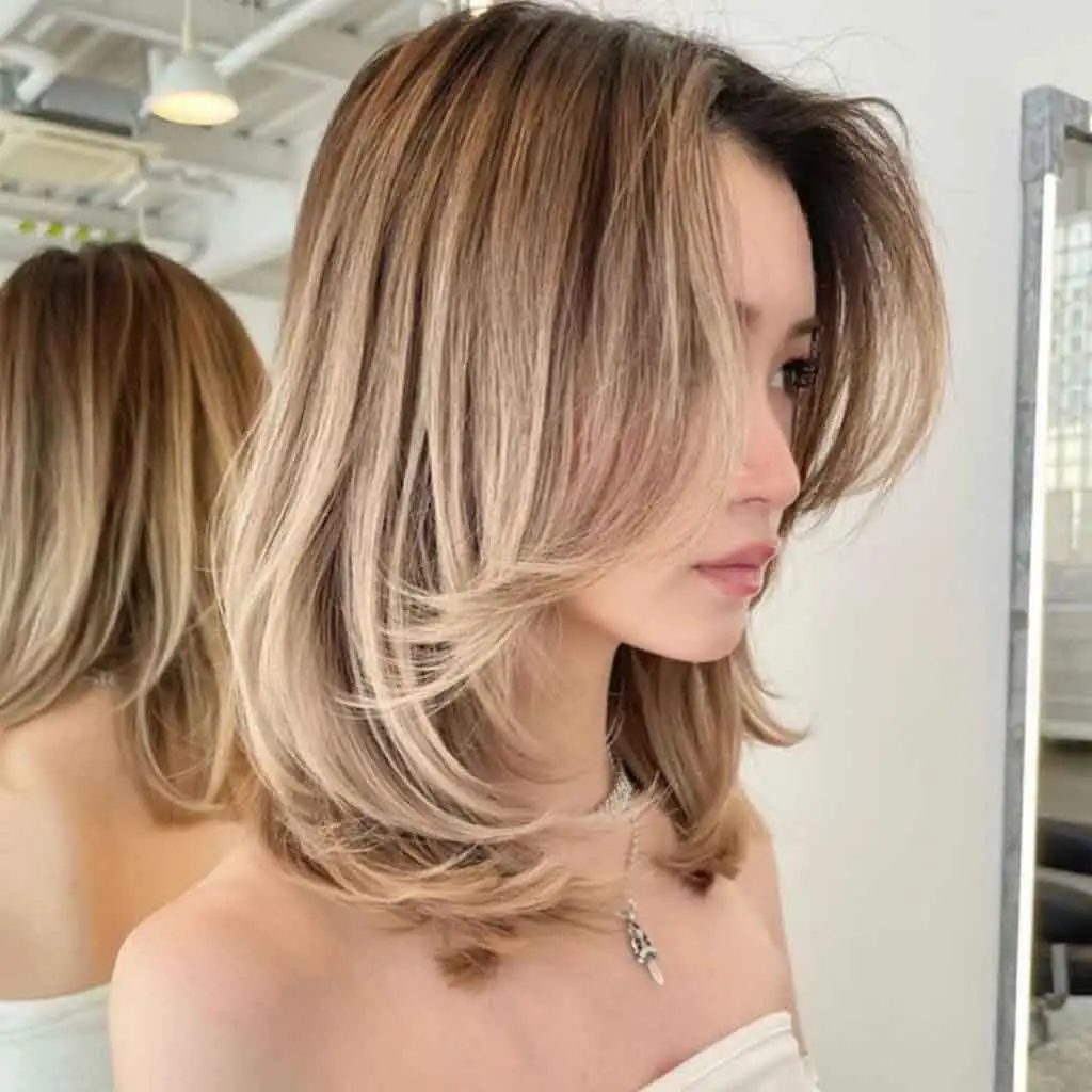 Blonde Face Framing Kitty Cut