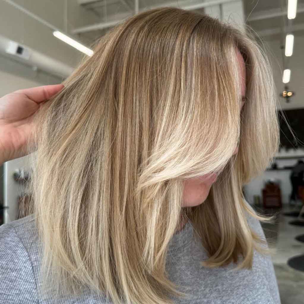 Golden Blonde Hair With Face Framing Layers on Medium Hair