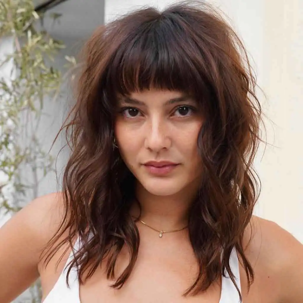 Medium Shaggy Layered Hair With Soft Blunt Bangs