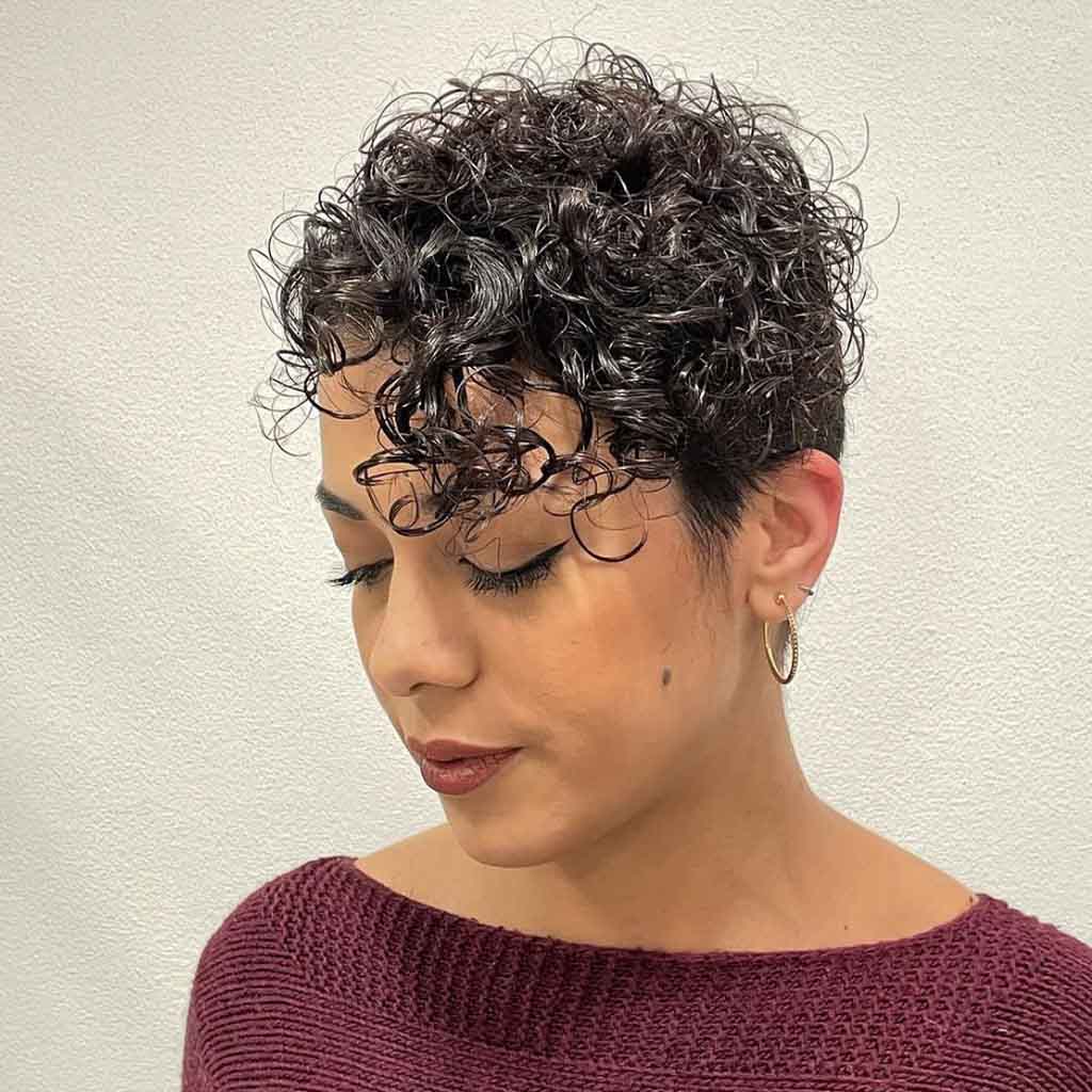Messy Glossy Black Curly Hair With Curly Fringe