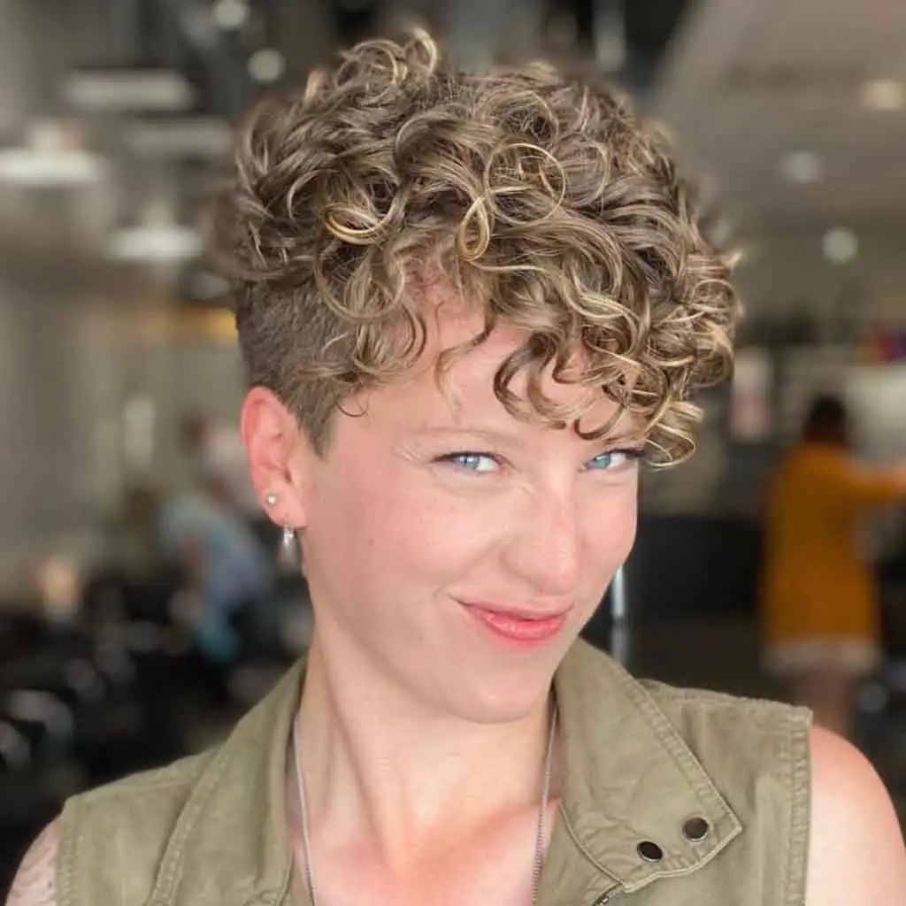 Blonde Curly Pixie Cut With Low Undercut