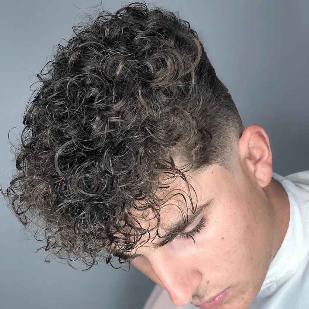 Tousled Curly Hair With Low Fade