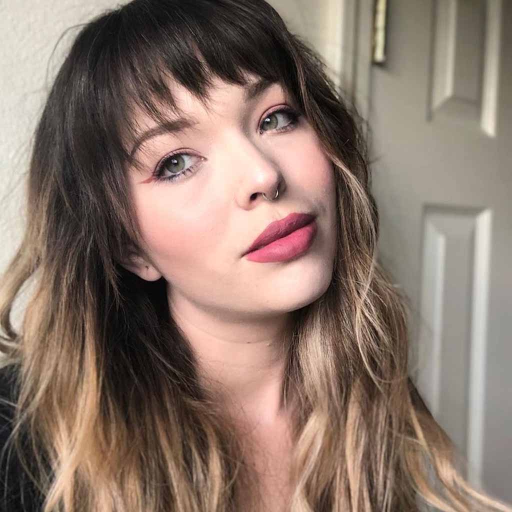 Black Gypsy Shag Hair With Blonde Highlights and Bangs