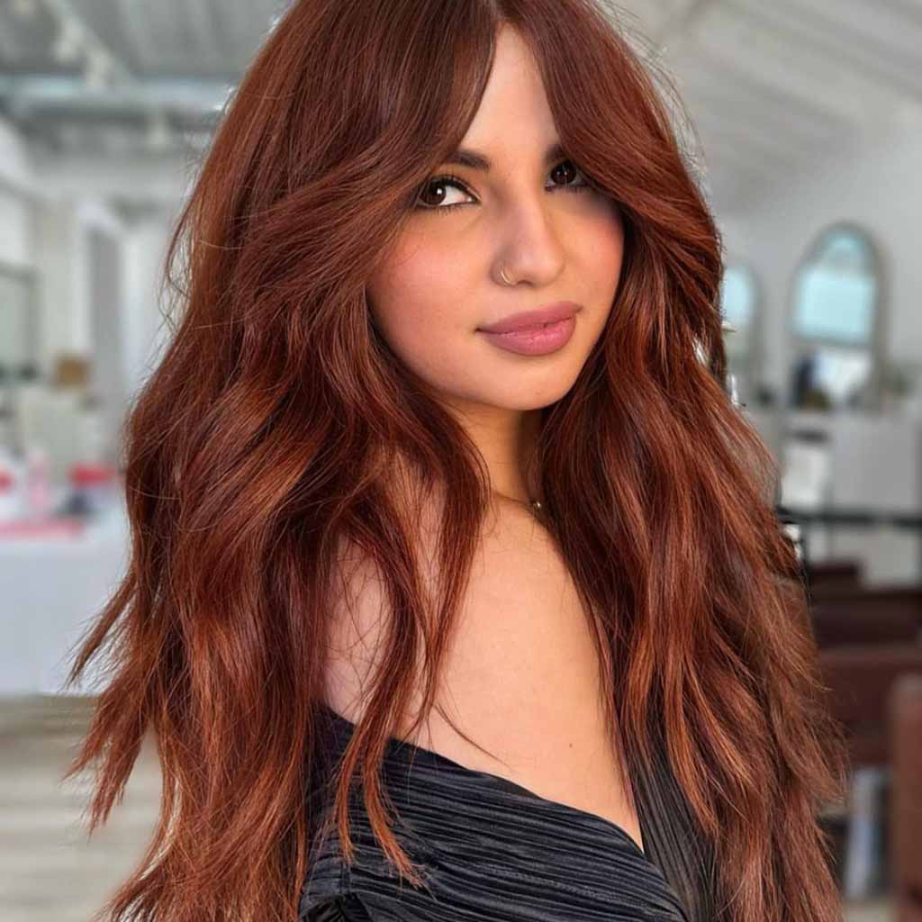 Long Wavy Ginger Brown Hair With Extended Curtain Bangs