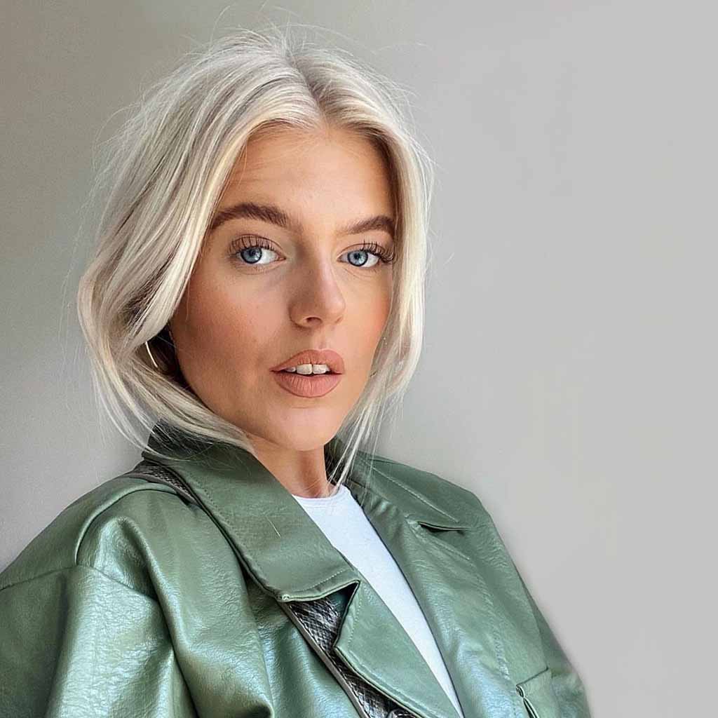 Blonde Hair Tucked in a Jacket