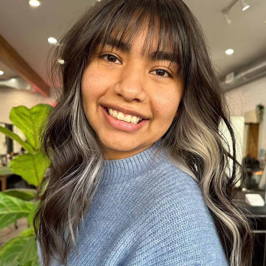 Peekaboo Hair With Wispy Bangs and Silver Highlights