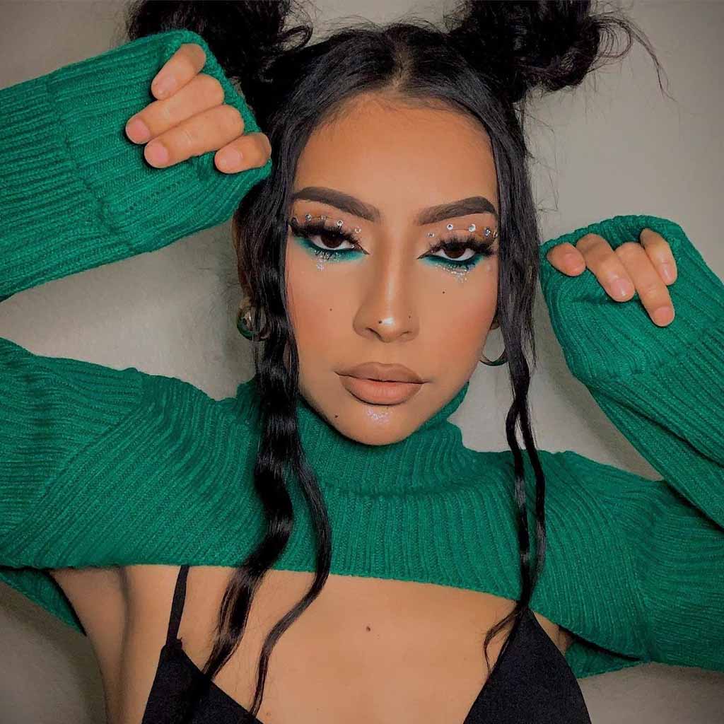 Space Bun With Tendrils on Black Hair