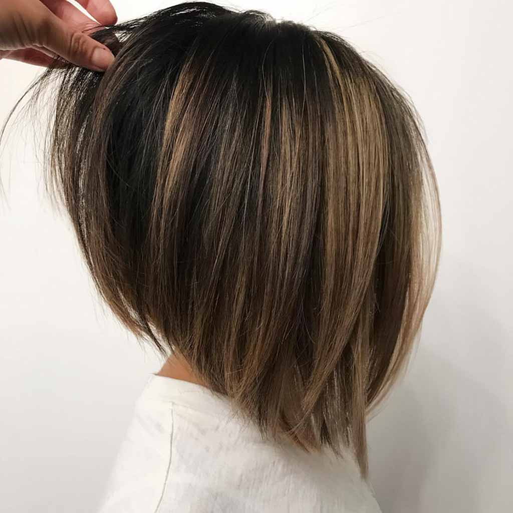 Textured Blonde Balayage on Fluffy Bob Cut