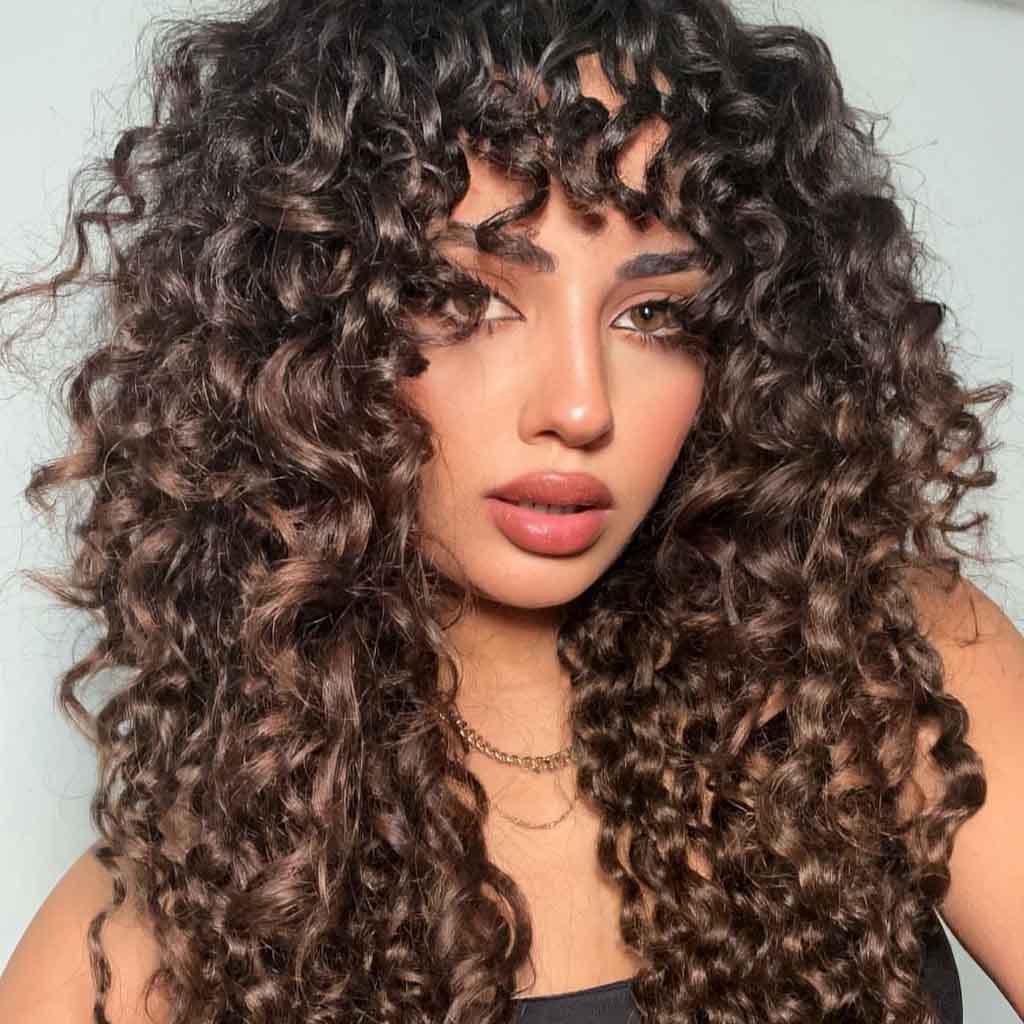Curly Layered Long Cut With Curly Bangs