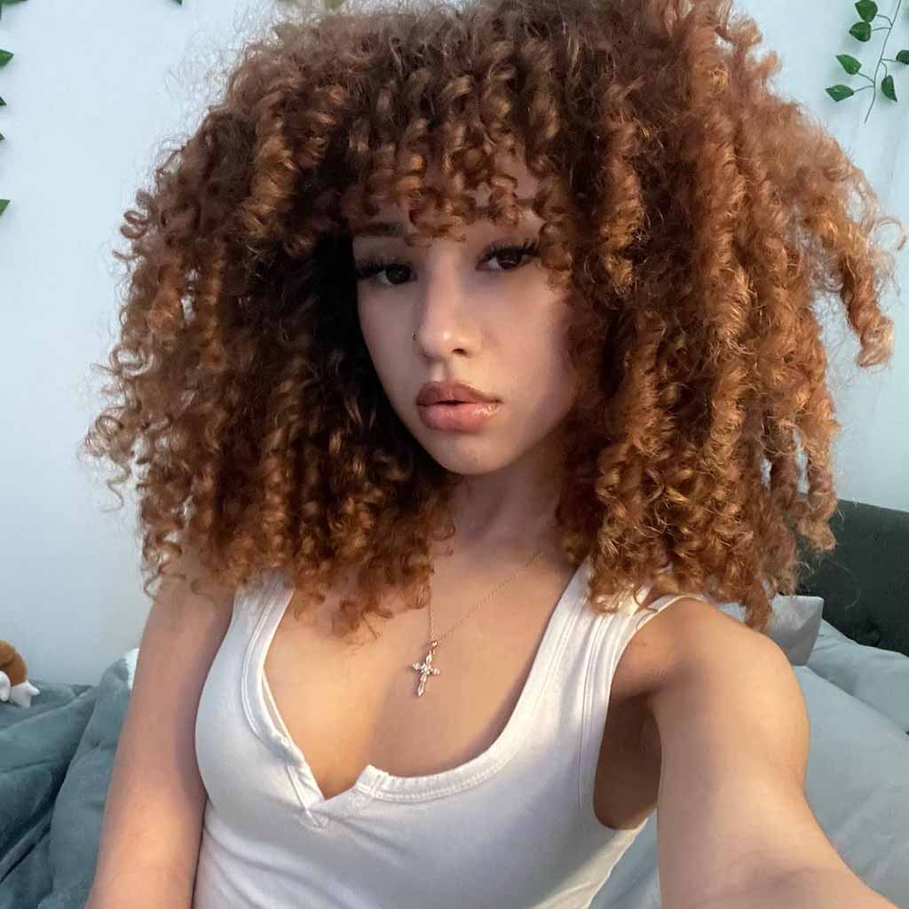 Medium Copper Coiled Hair With Extended Curly Bangs