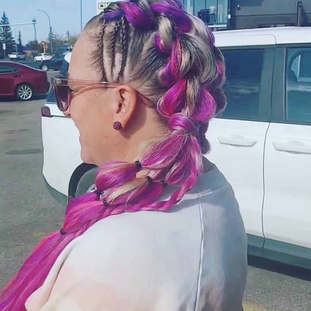 Multi-Colored Dutch Braids Tied With Bubble Ponytails