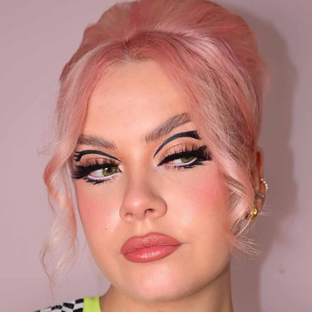 Pink Beehive Hair With Curly Tendrils