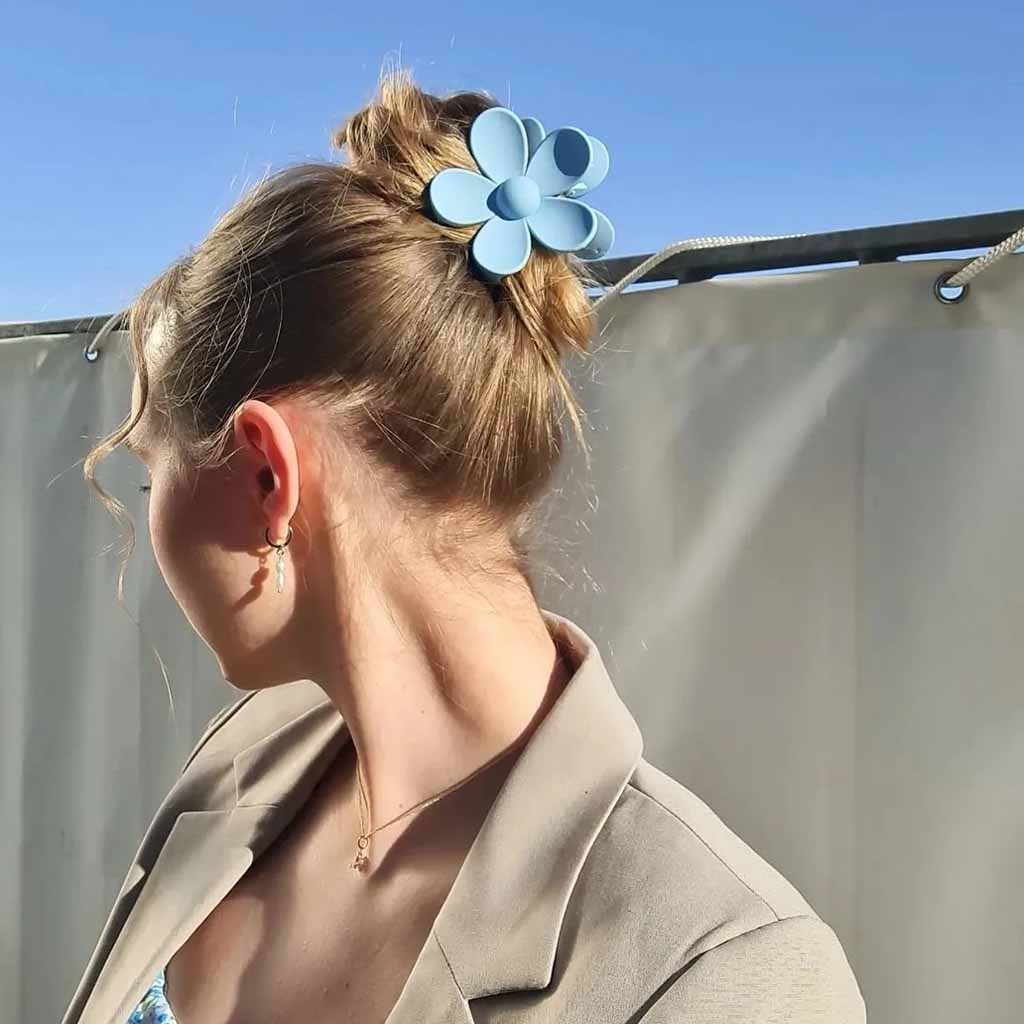 High Messy Bun Tied by a Clutcher