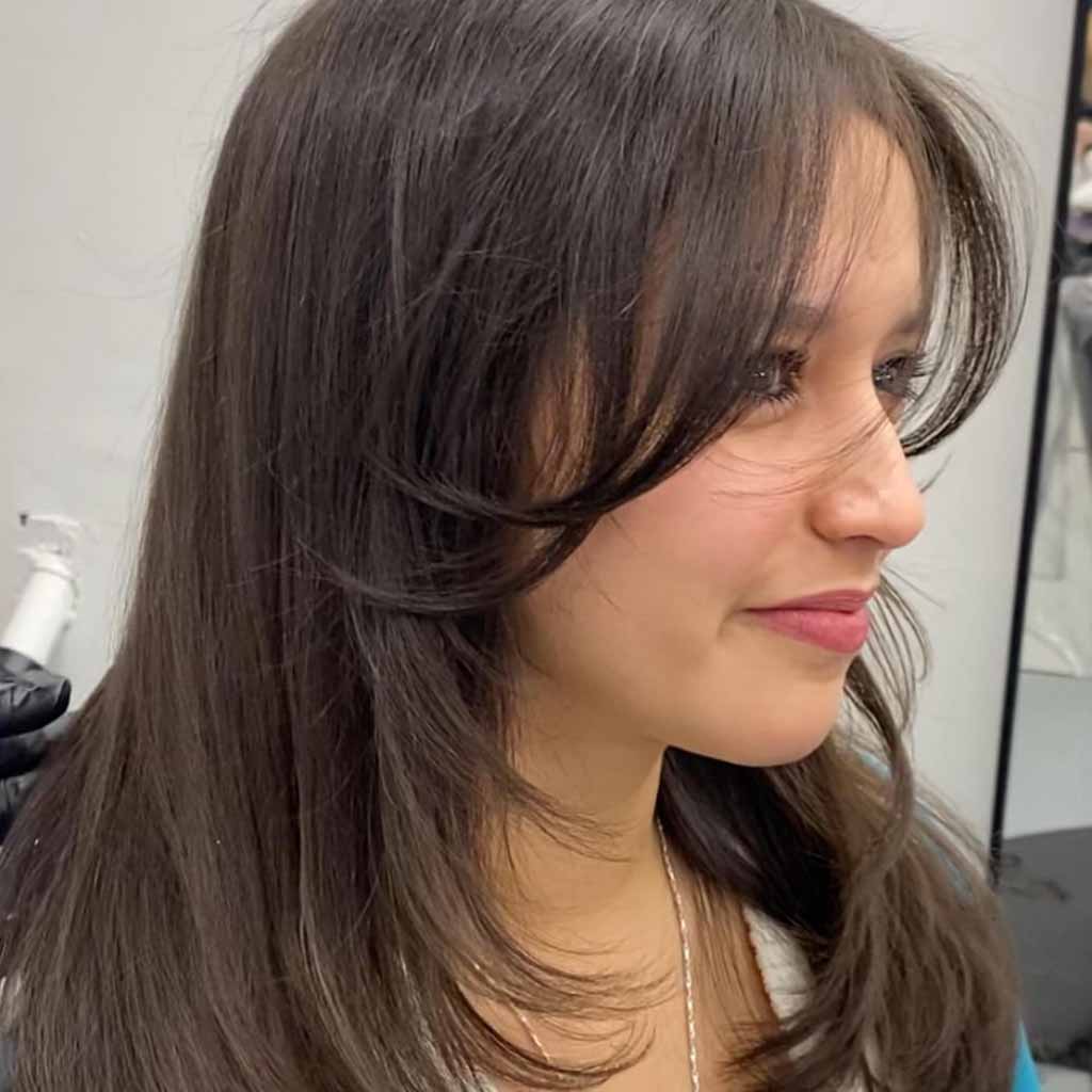 Deep U-Cut With Face Framing Layers and Curtain Bangs