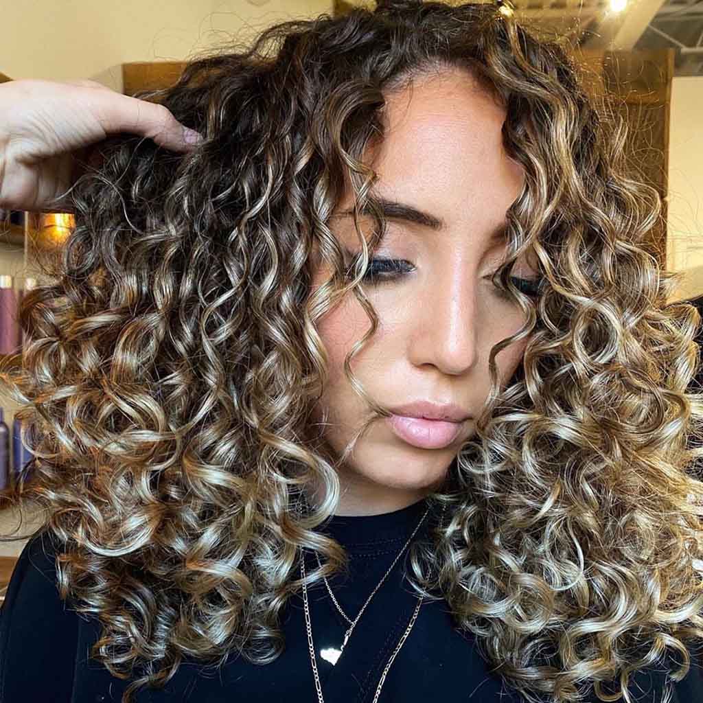 Long Blonde Layered Curly Cut