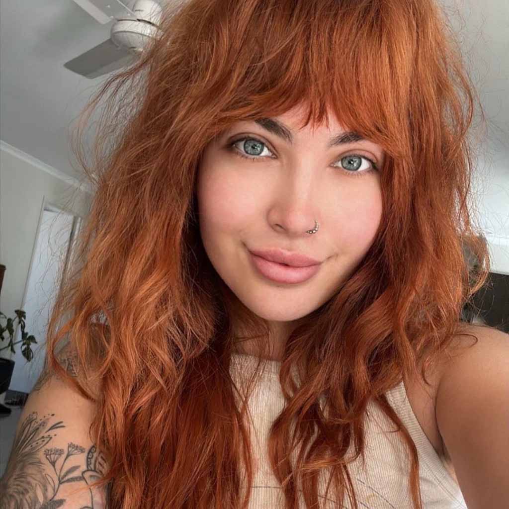 Long Ginger Gypsy Shag Cut With Asymmetric Bangs