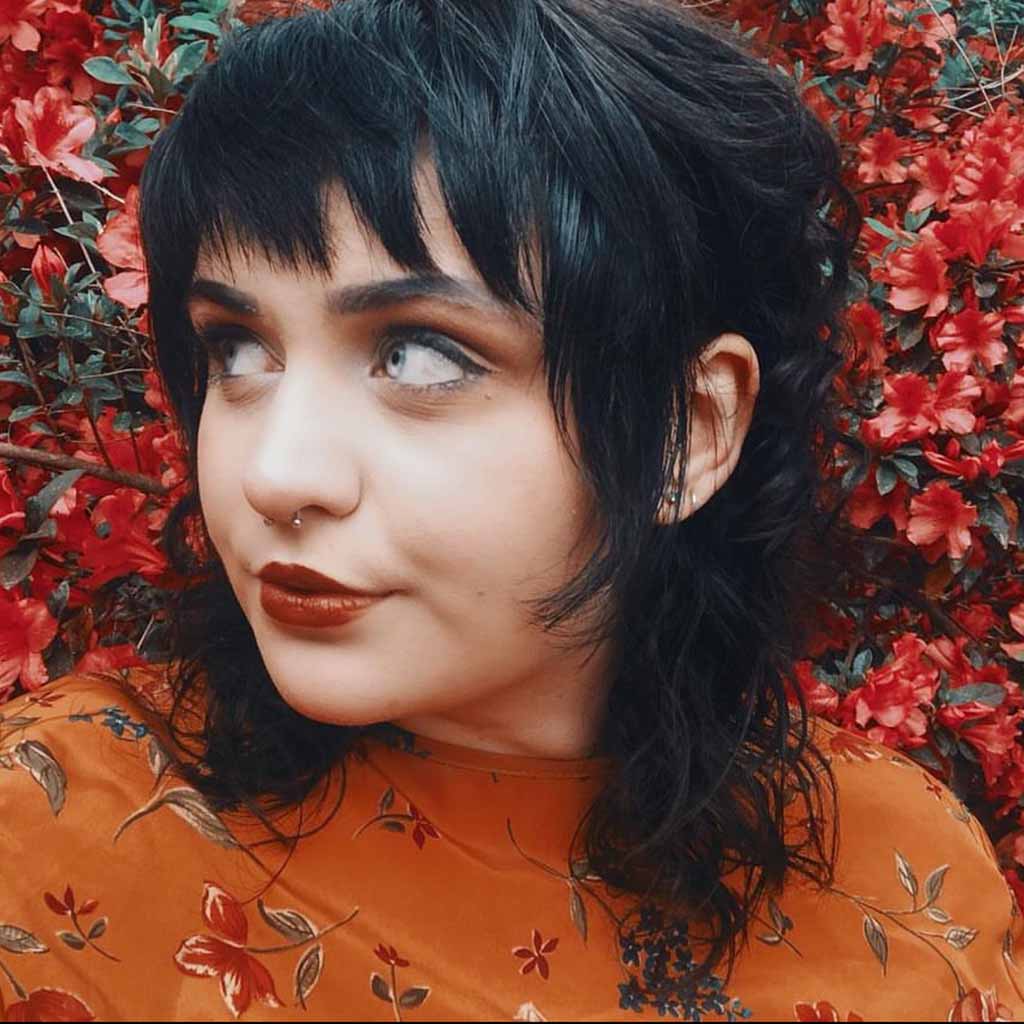 Short Black Gypsy Shag With Micro Bangs
