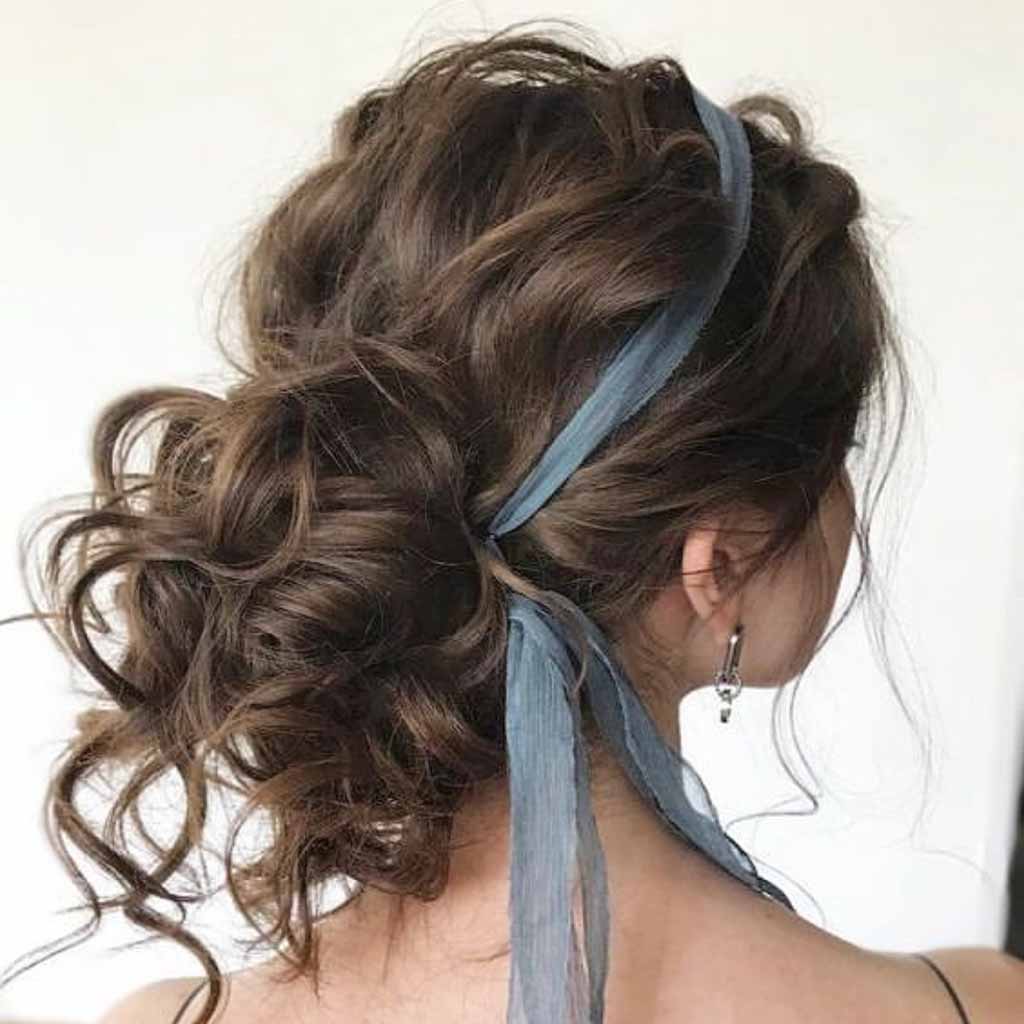 Curly Messy Low Bun