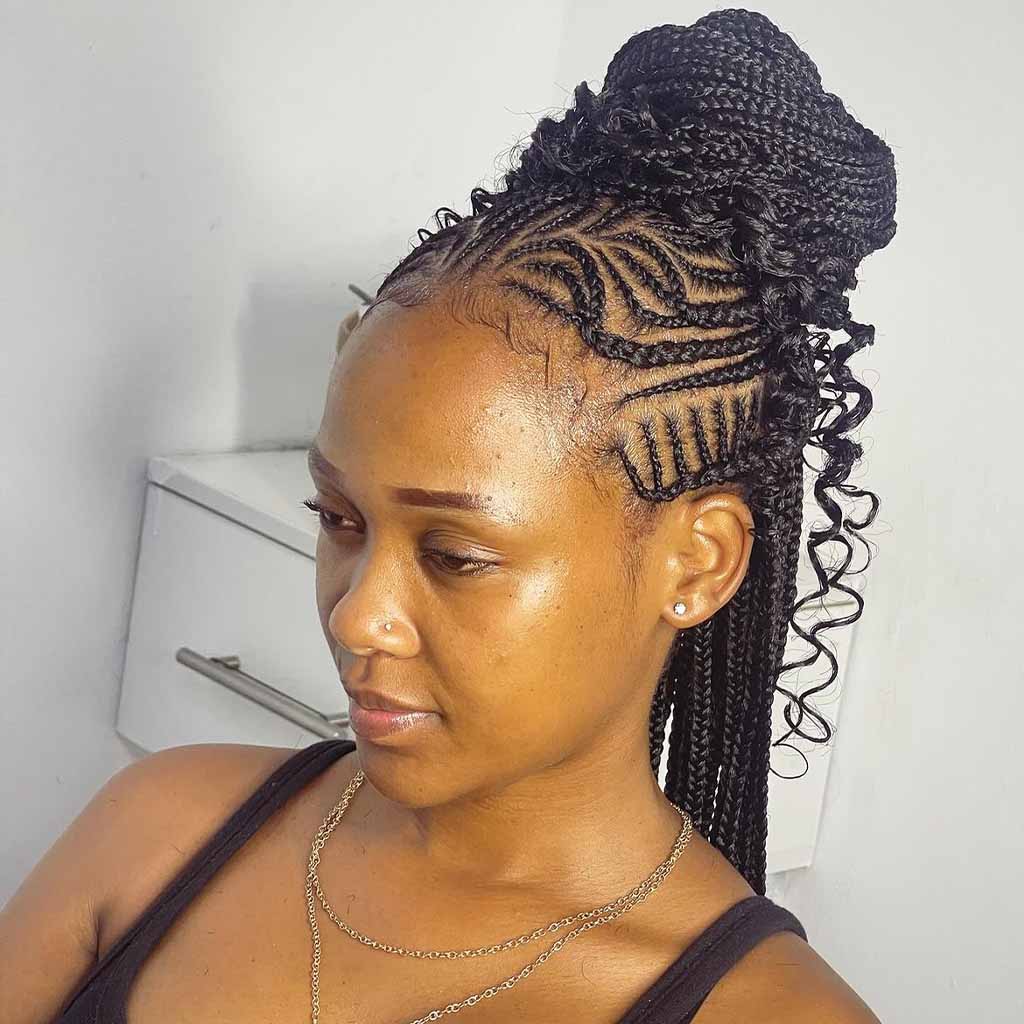 Tribal Braids With High Bun and Curls