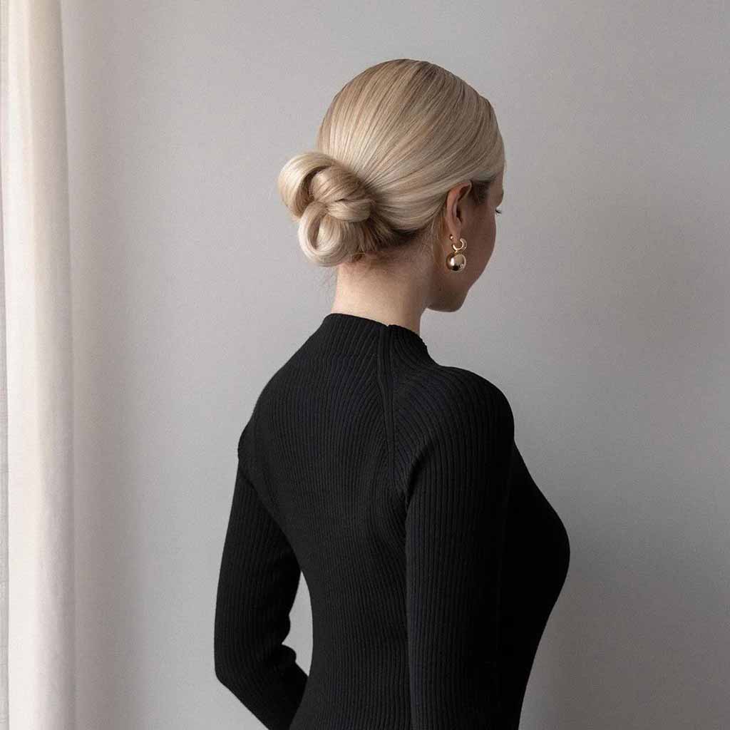 Sleek Blonde Twisted Low Bun