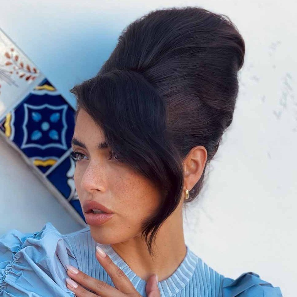 Classic Blowout Beehived Hair With Side-Swept Wavy Flick