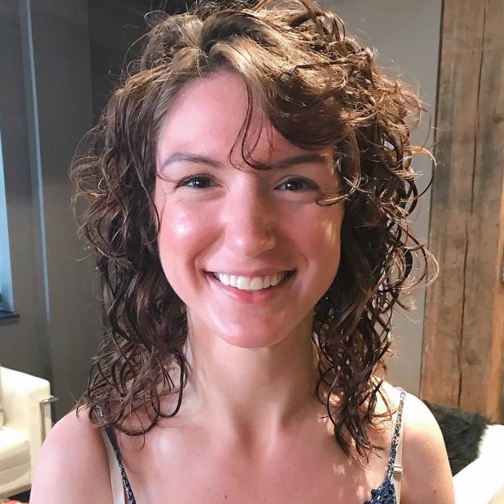 Medium Curly Gypsy Shag Cut With Side-Swept Bangs