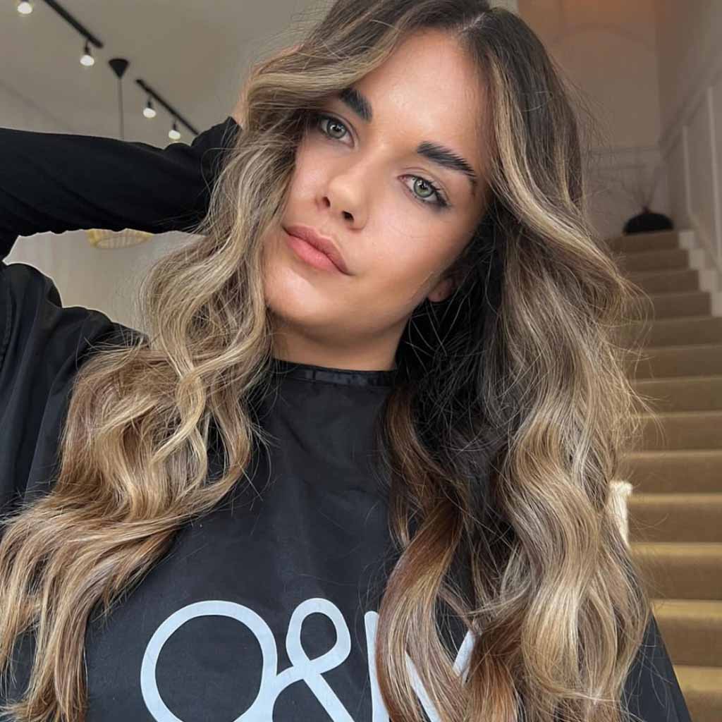 Sun-Kissed Brunette Balayage on Long Wavy Hair