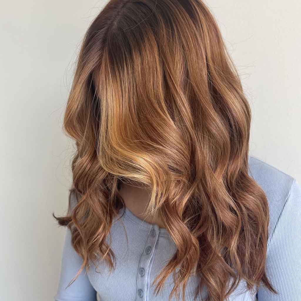 Auburn Hair With a Blonde Face Framing Layers
