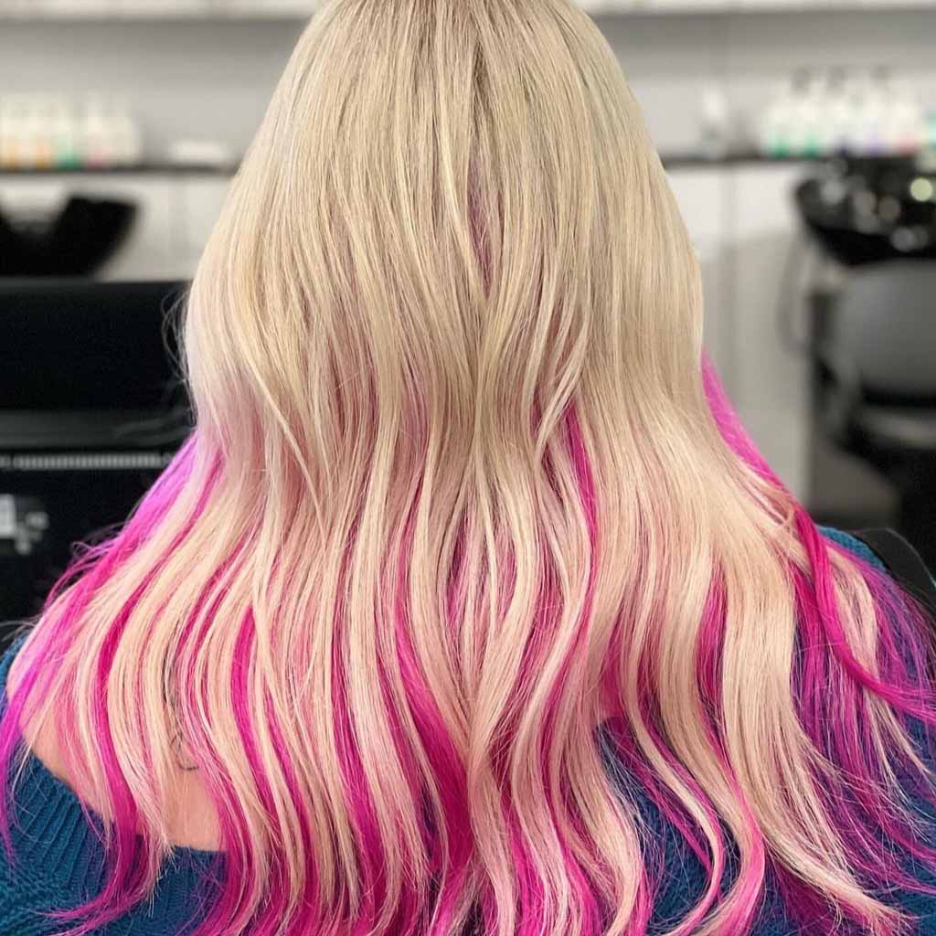 Wavy Blonde Hair With Hot Pink Highlights