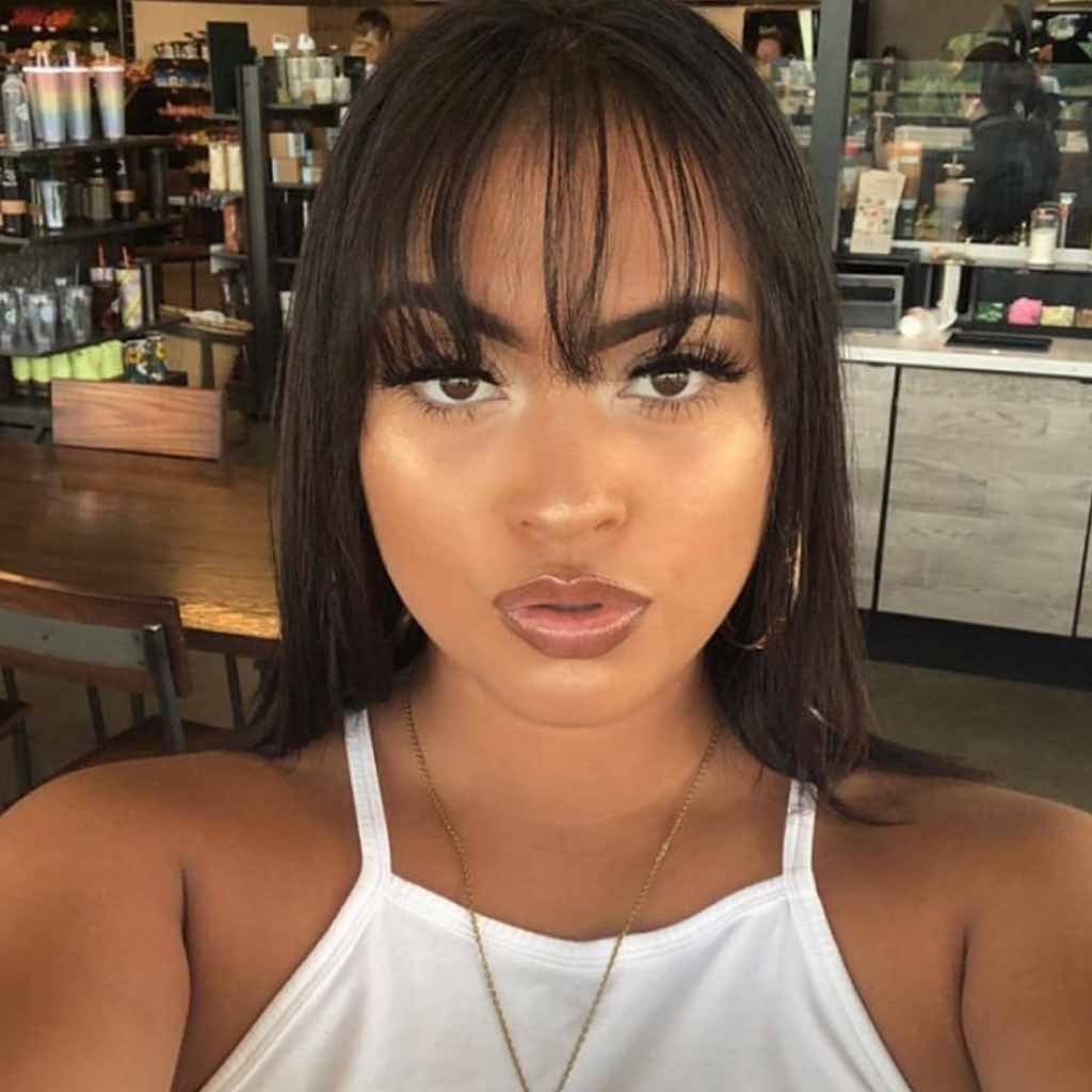 Wavy Medium Shag Cut With Wispy Bangs