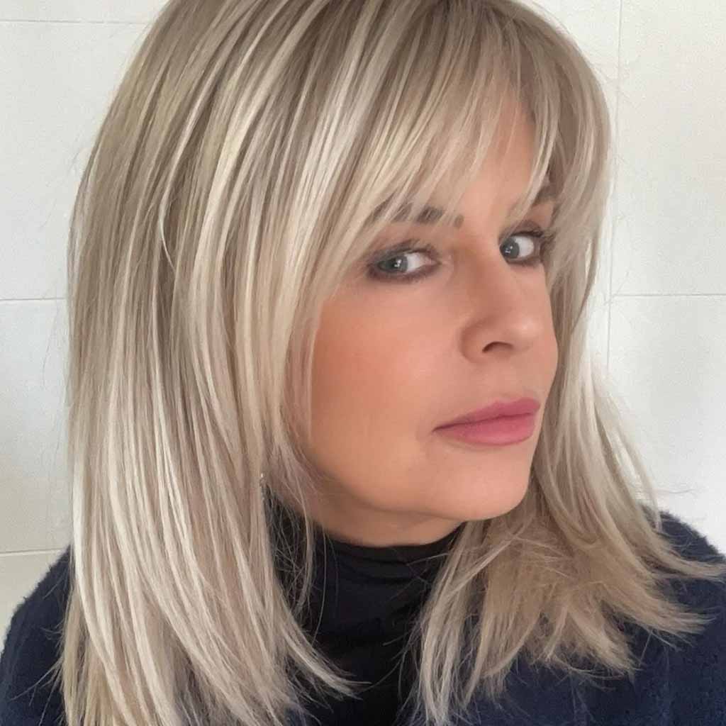 Shoulder Length Ash Blonde Layered Thin Hair With Wispy Bangs