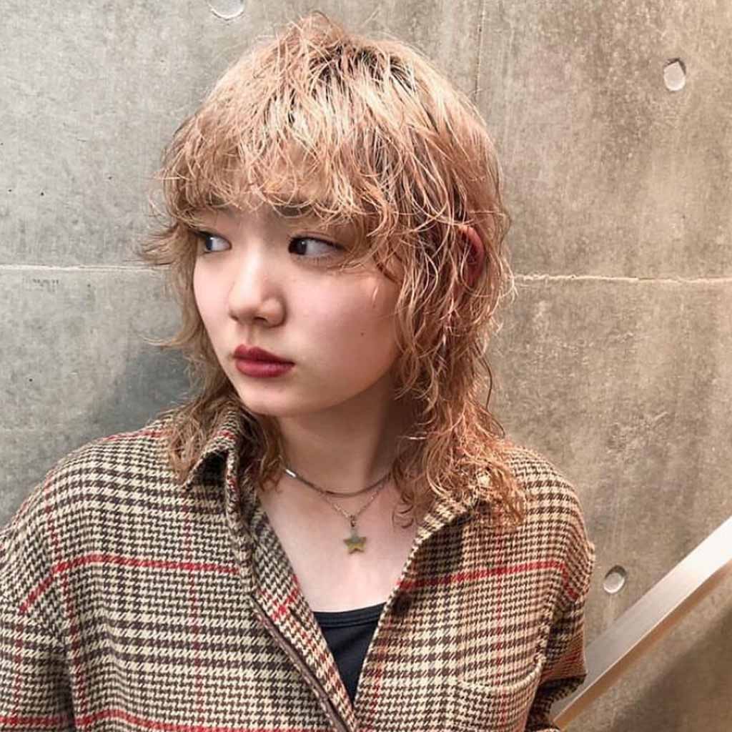 80’s Style Medium Wolf Cut With Tousled Bangs