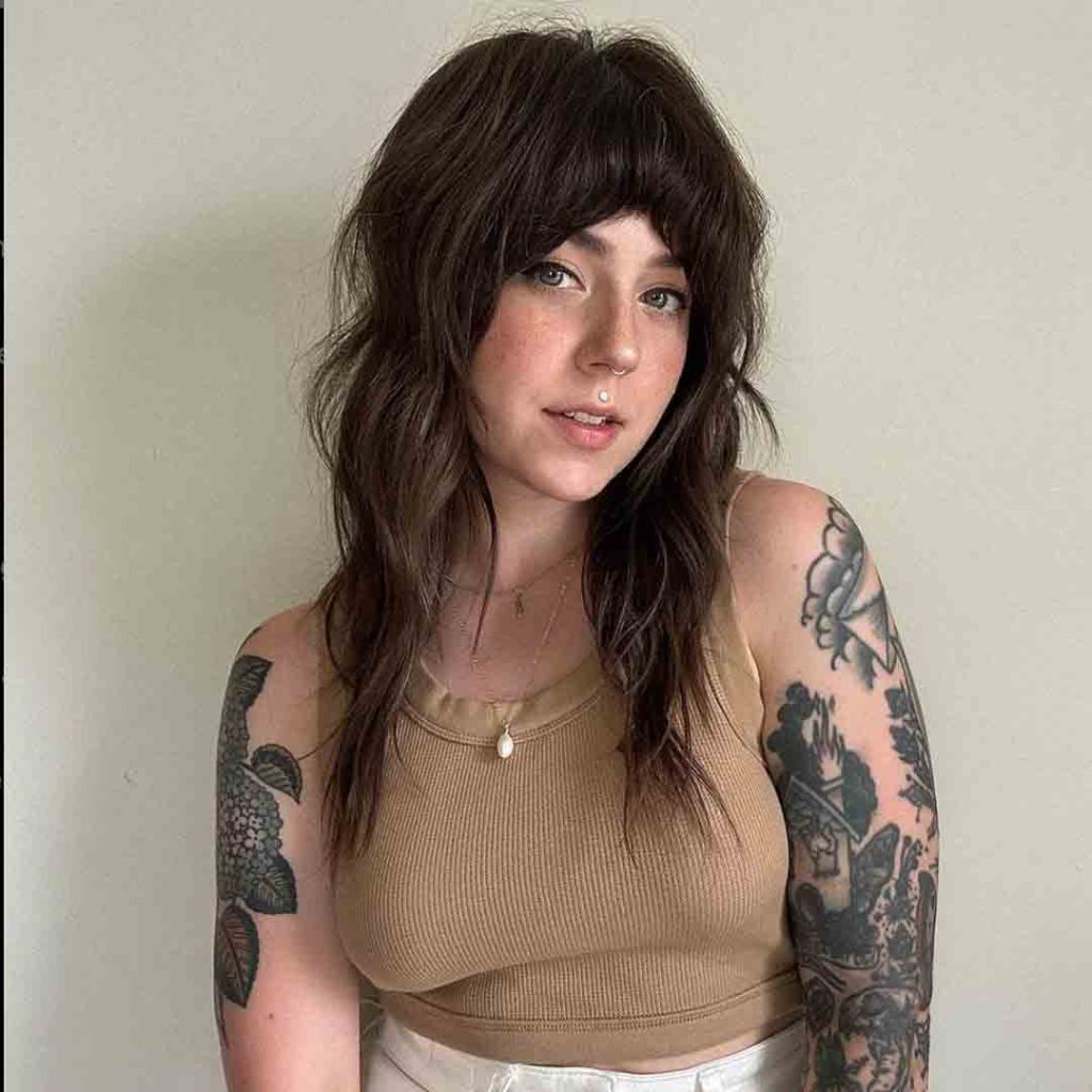 Medium Shag Cut With Curved Bangs