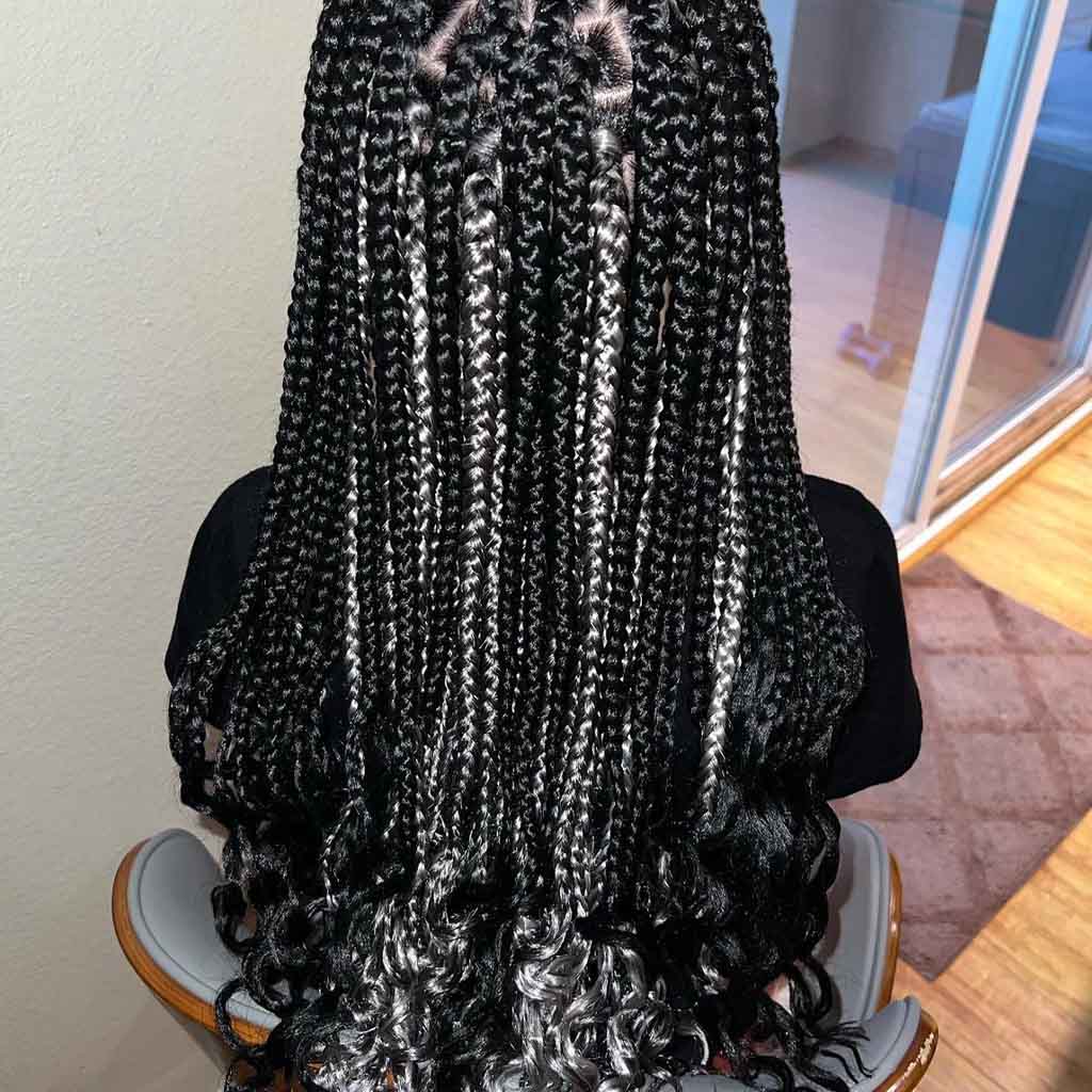 1. Peek a Boo Black and Grey Box Braided Wolf Cut With Curled Ends