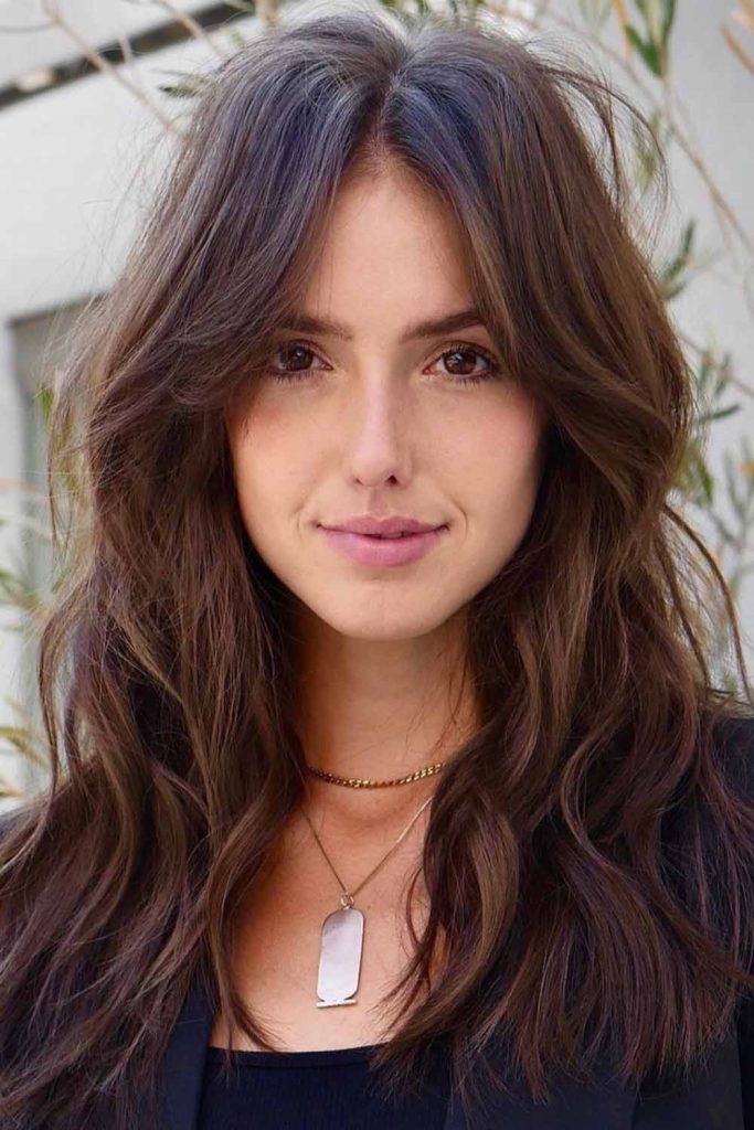 Textured Brunette Hair With Curtain Bangs