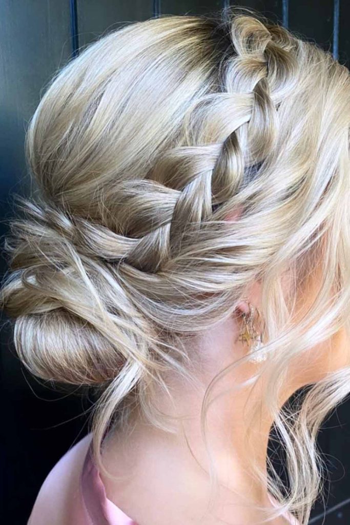 Low Bun With Side Pull-Through Braid