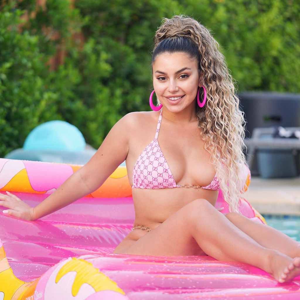 High Curly Ponytail on Blonde Hair
