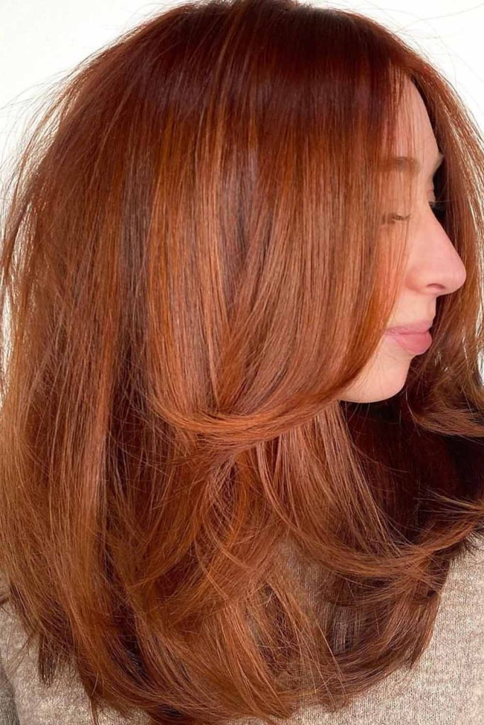 Medium Fluffy Chestnut Hair With Face Framing Layers