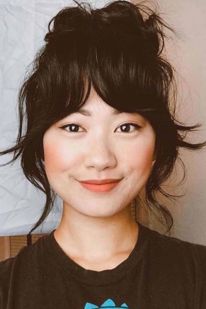 Razor Cut Hair With Curtain Bangs