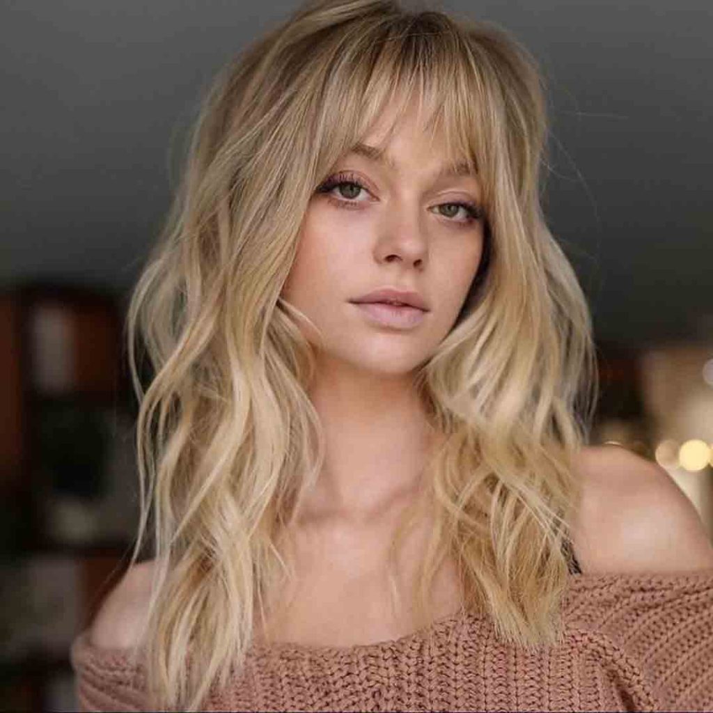 Wavy Blonde Octopus Cut With Wispy Bangs