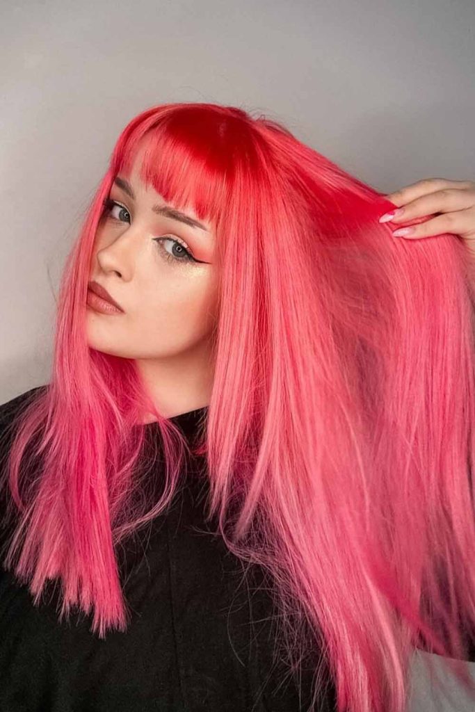 Long Coral Pink Straight Hair With Blunt Bangs