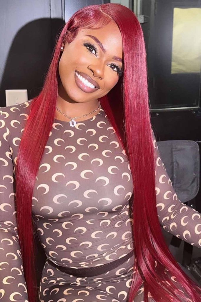Long and Sleek Red Weave With Side Part